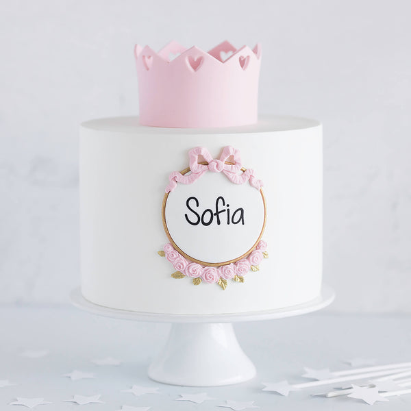 Bolo com coroa rosa